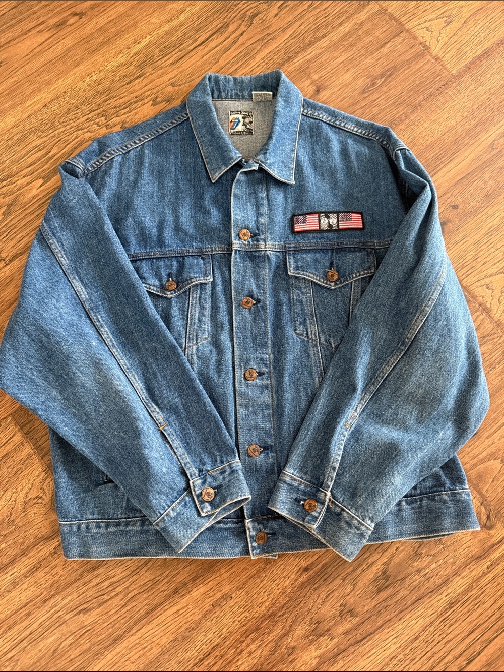 the Rolling Stones Medium Blue Denim Jacket with Flag Patch